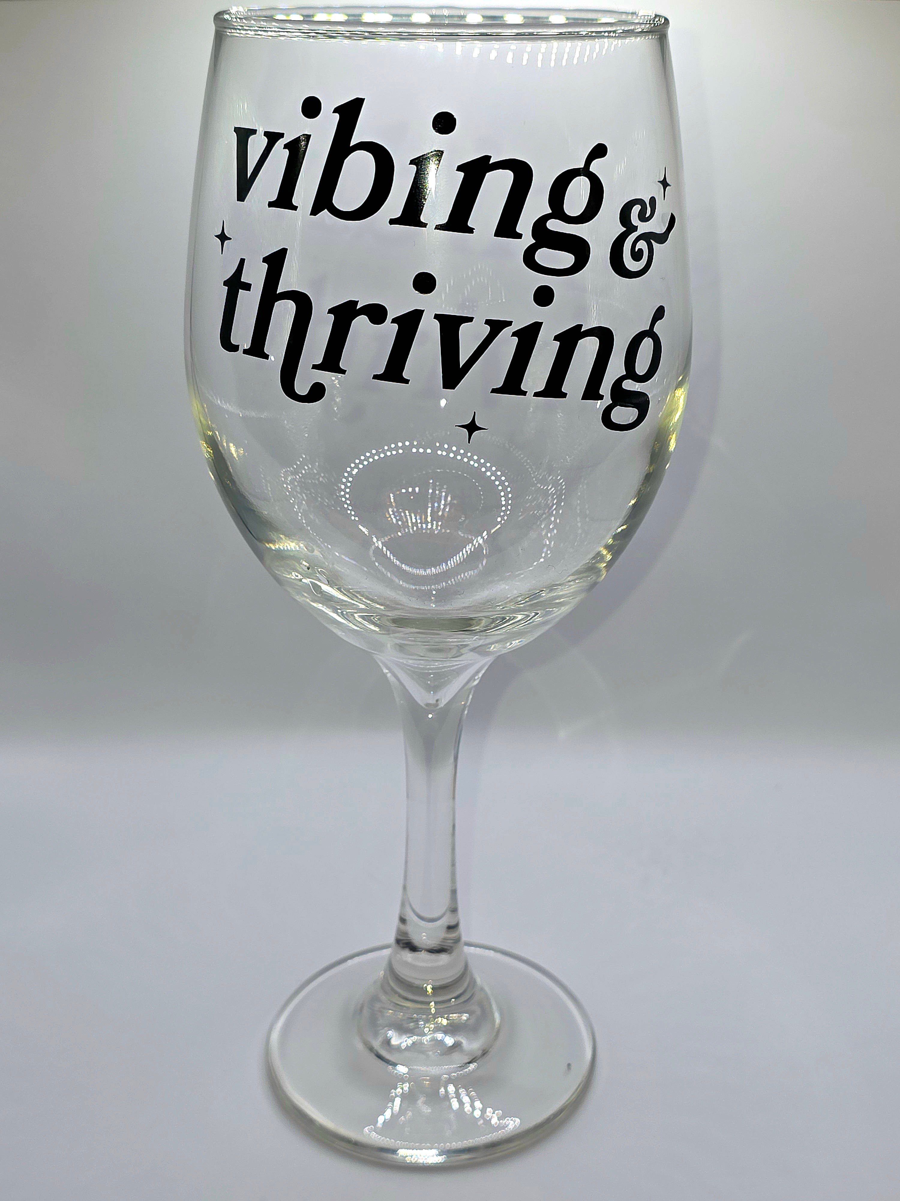Vibing & Thriving Wine Glass